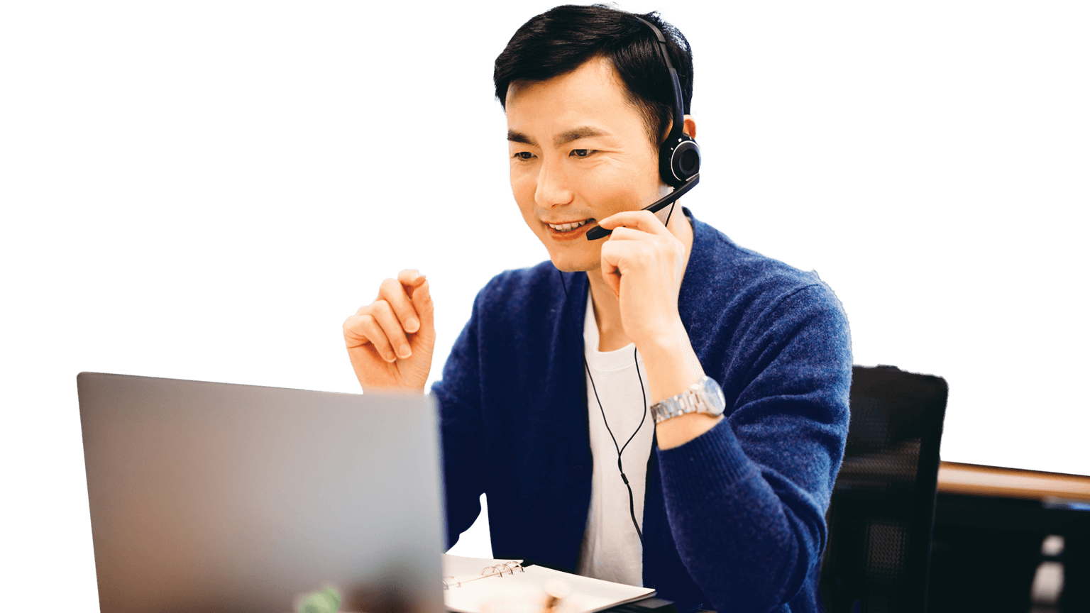 Businessman talking on his laptop wearing a headset