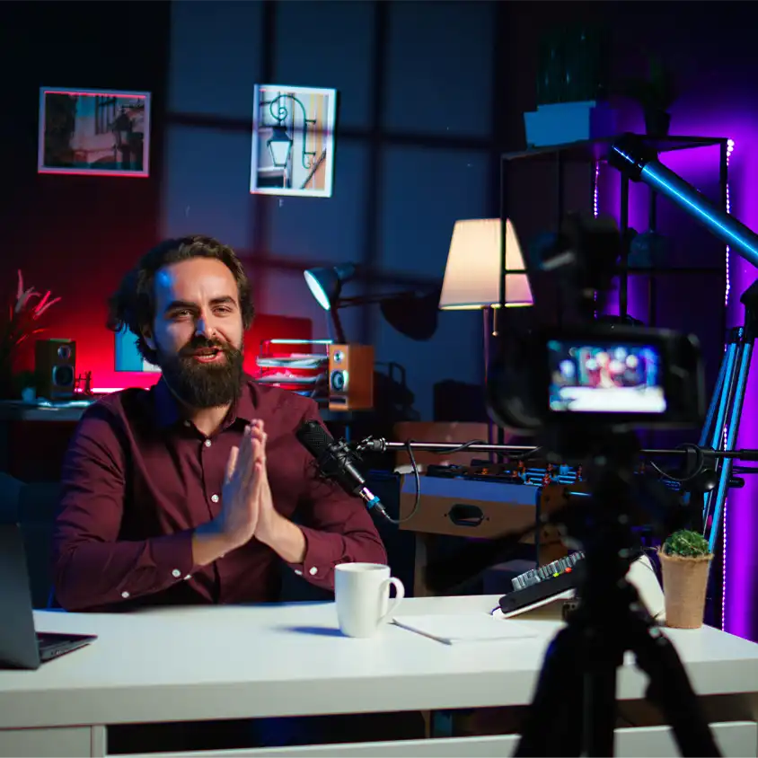 photo representing a businessman pre-recording a webinar for a simlive webcast on globalmeet