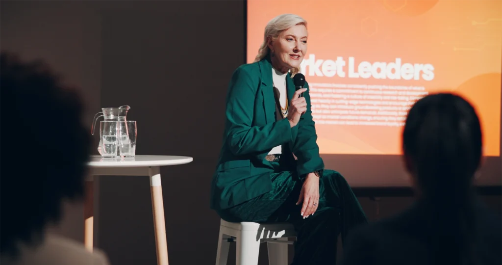 Female speaker giving engaging presentation