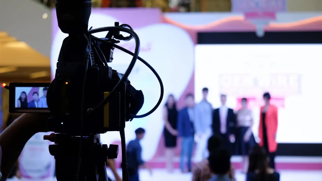 image of a event producer running corporate broadcasting services